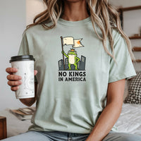 No Kings in America Frog T-Shirt – Rebellious Cartoon Graphic Tee – Funny Freedom Design