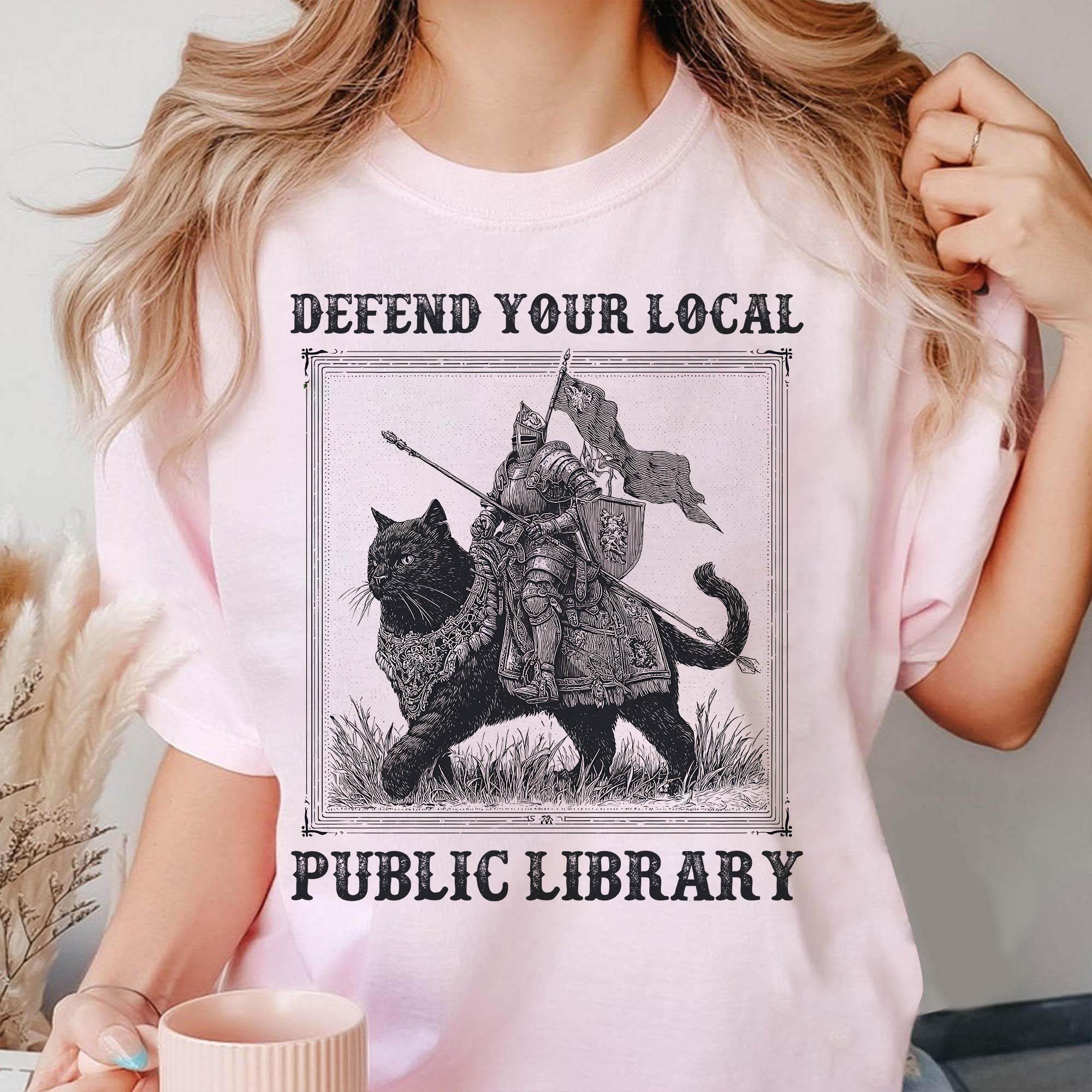 Defend Your Local Public Library Shirt – Funny Knight Cat Tee – Book Lover Reading Gift