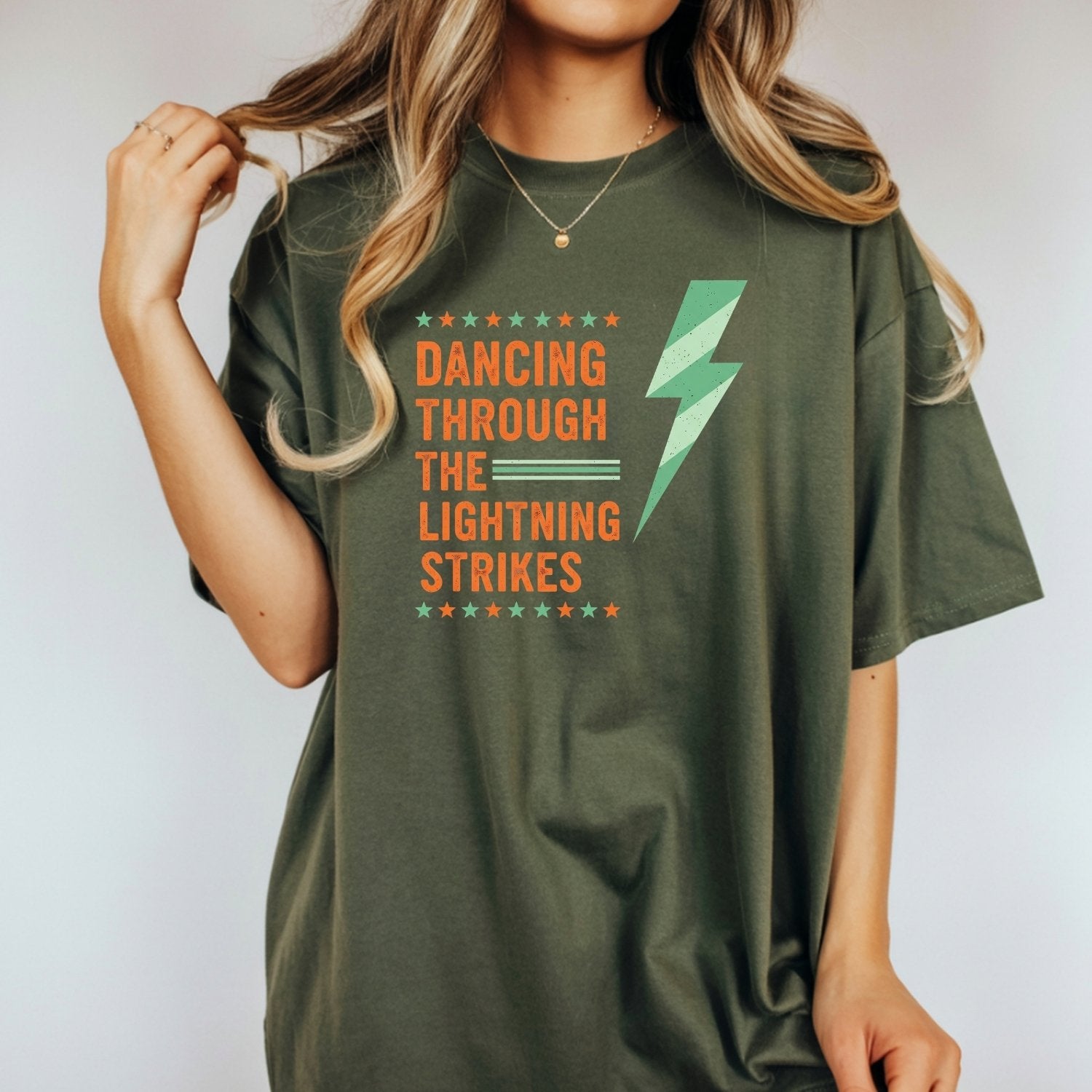 Dancing Through the Lightning Strikes Shirt – Vintage Lightning & Showgirl Era Graphic Tee