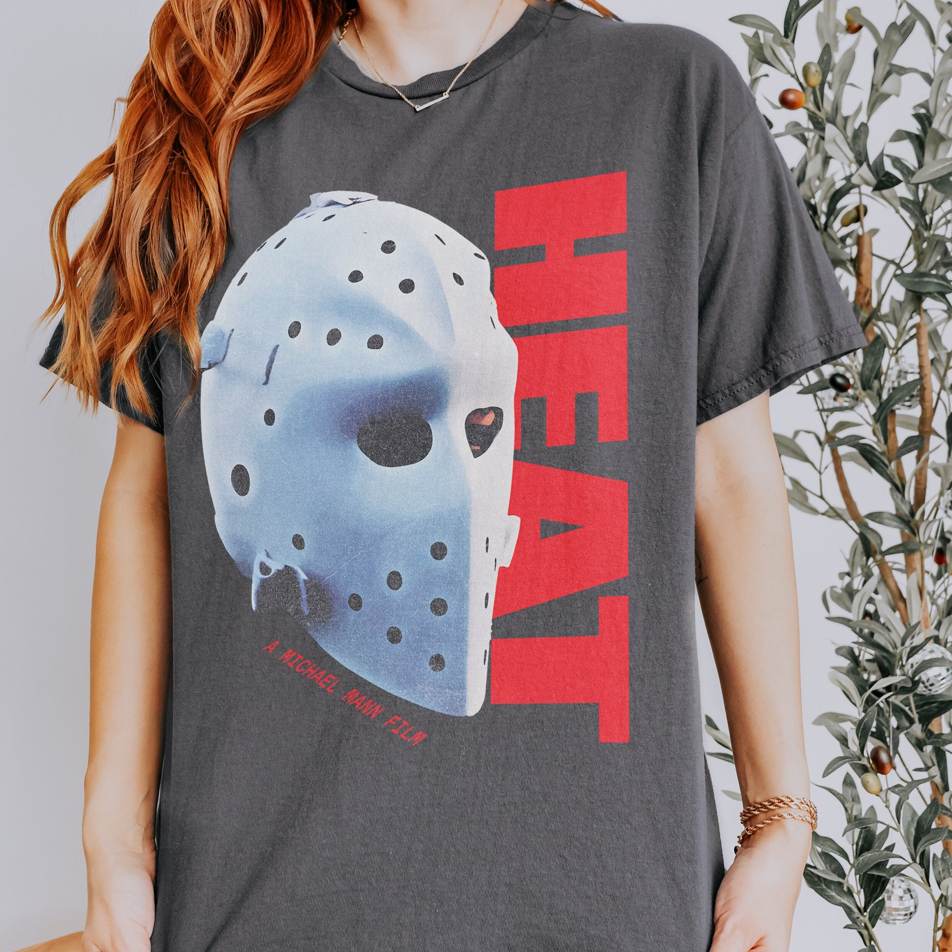 Retro 90s Action Graphic Tee – Heat-Inspired Hockey Mask T-Shirt
