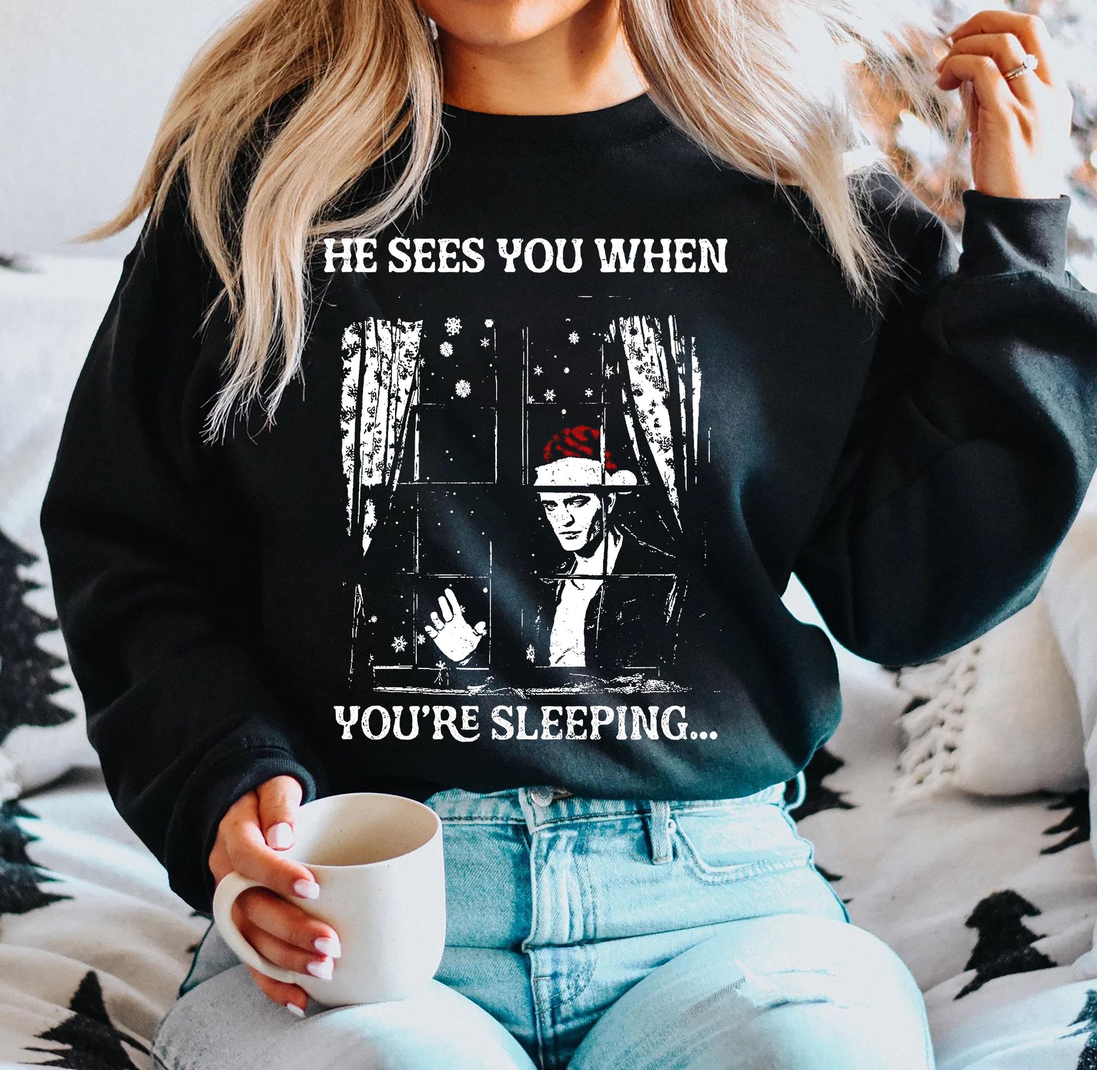 He Sees You When You’re Sleeping Christmas Shirt – Vampire-Inspired Holiday Tee for Fans