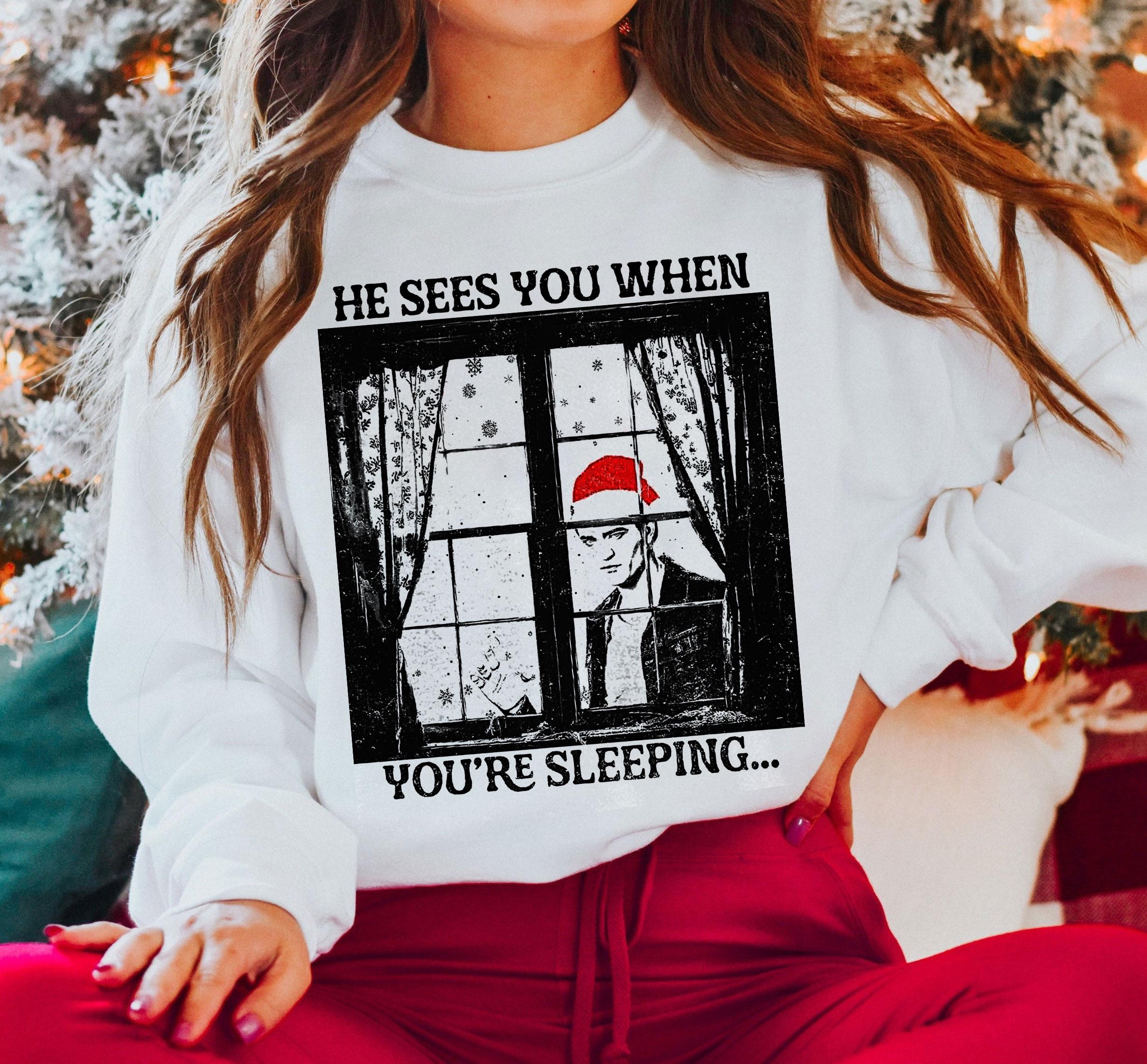 He Sees You When You’re Sleeping Christmas Shirt – Vampire-Inspired Holiday Tee for Fans