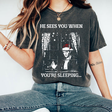 He Sees You When You’re Sleeping Christmas Shirt – Vampire-Inspired Holiday Tee for Fans