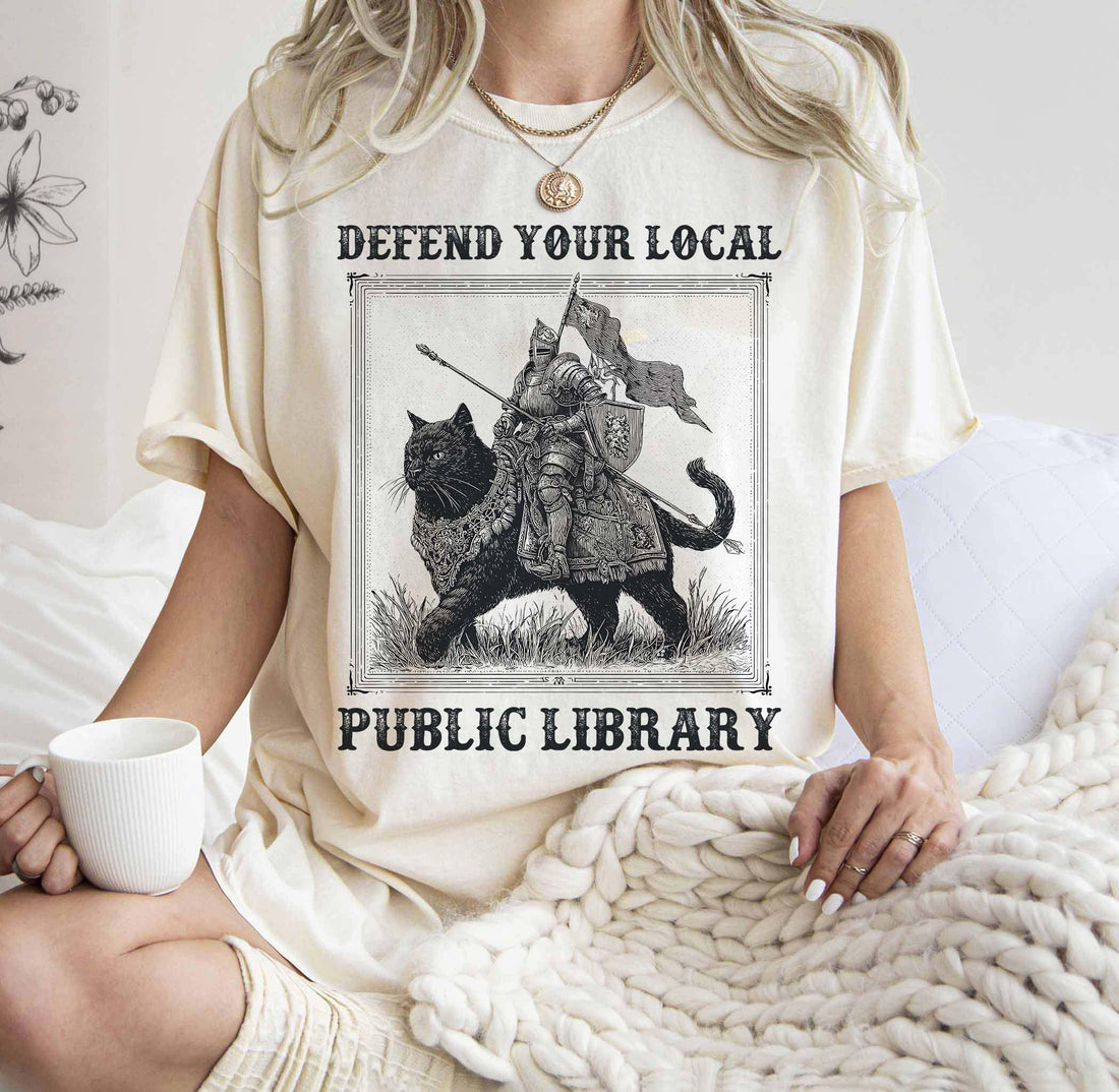 Defend Your Local Public Library Shirt – Funny Knight Cat Tee – Book Lover Reading Gift