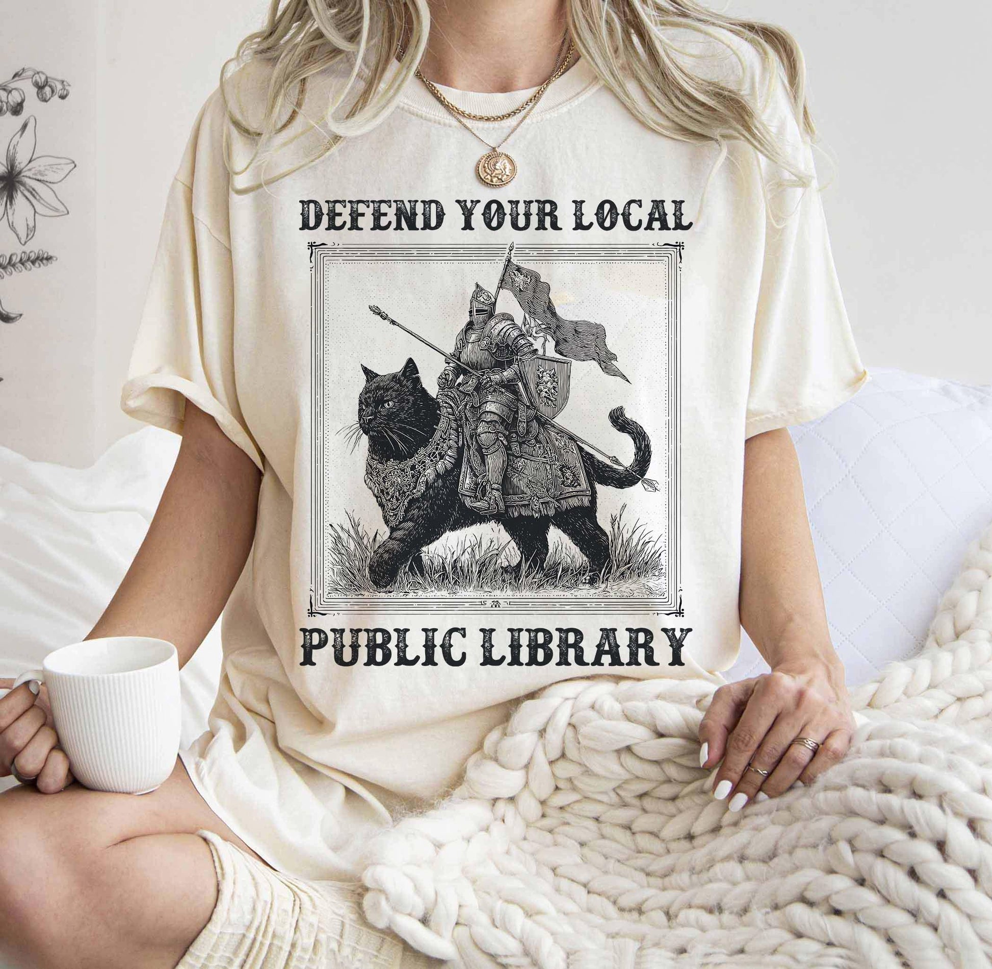 Defend Your Local Public Library Shirt – Funny Knight Cat Tee – Book Lover Reading Gift