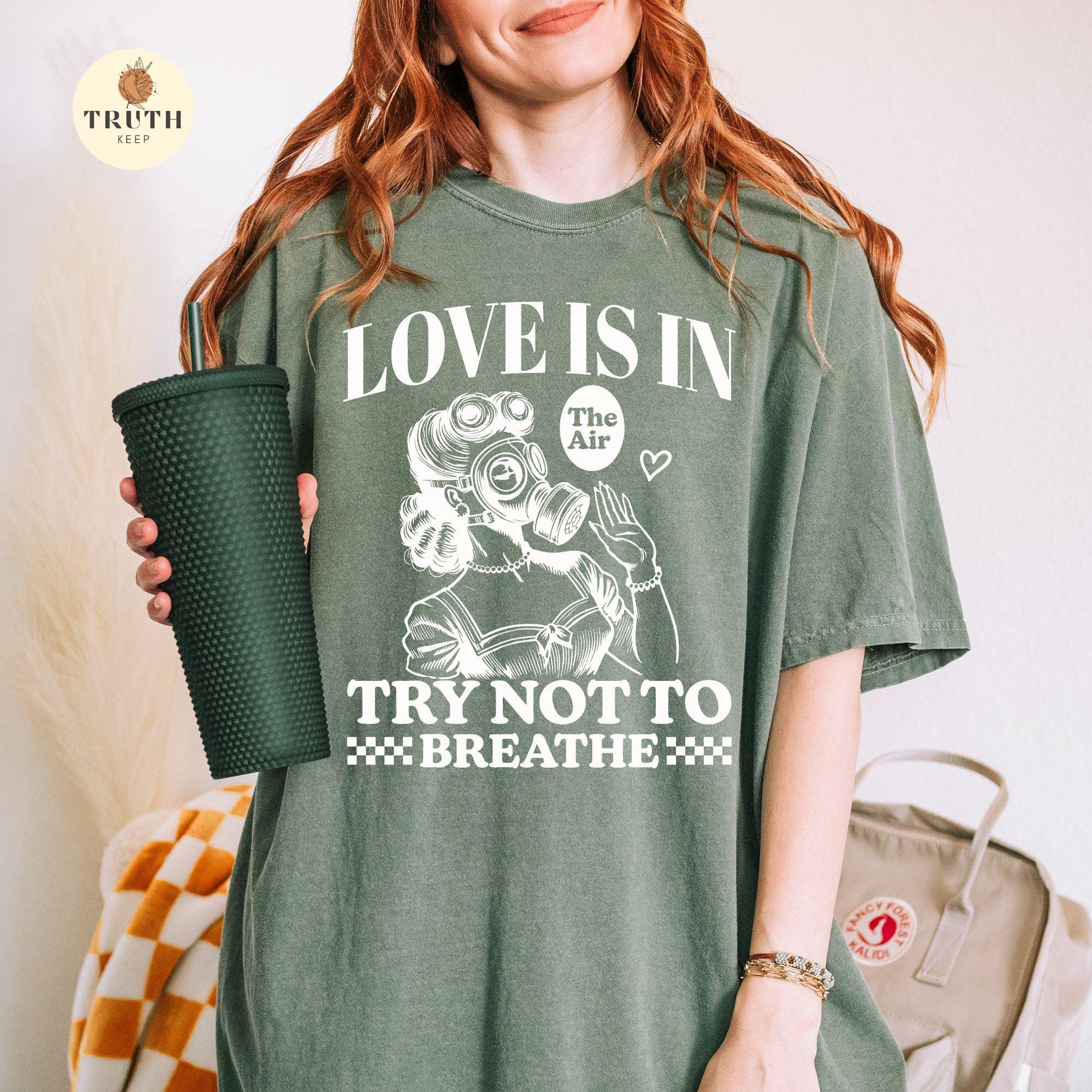 Funny Anti-Valentine Woman Graphic T-Shirt – Love Is in the Air Humor Tee