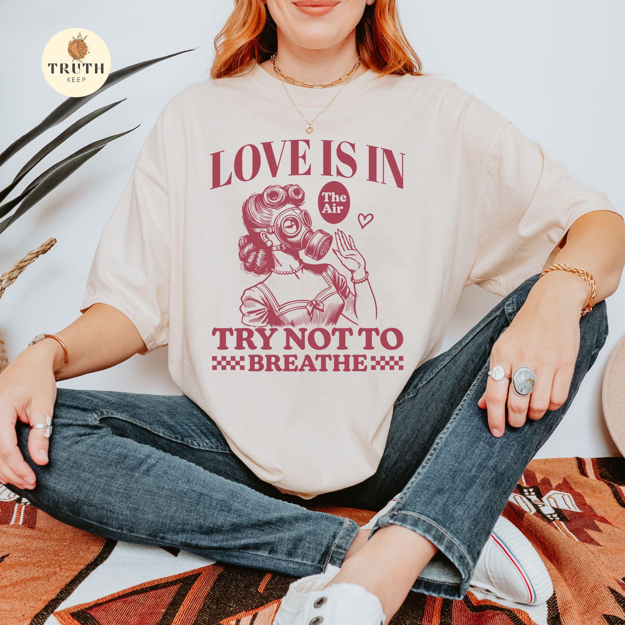 Funny Anti-Valentine Woman Graphic T-Shirt – Love Is in the Air Humor Tee