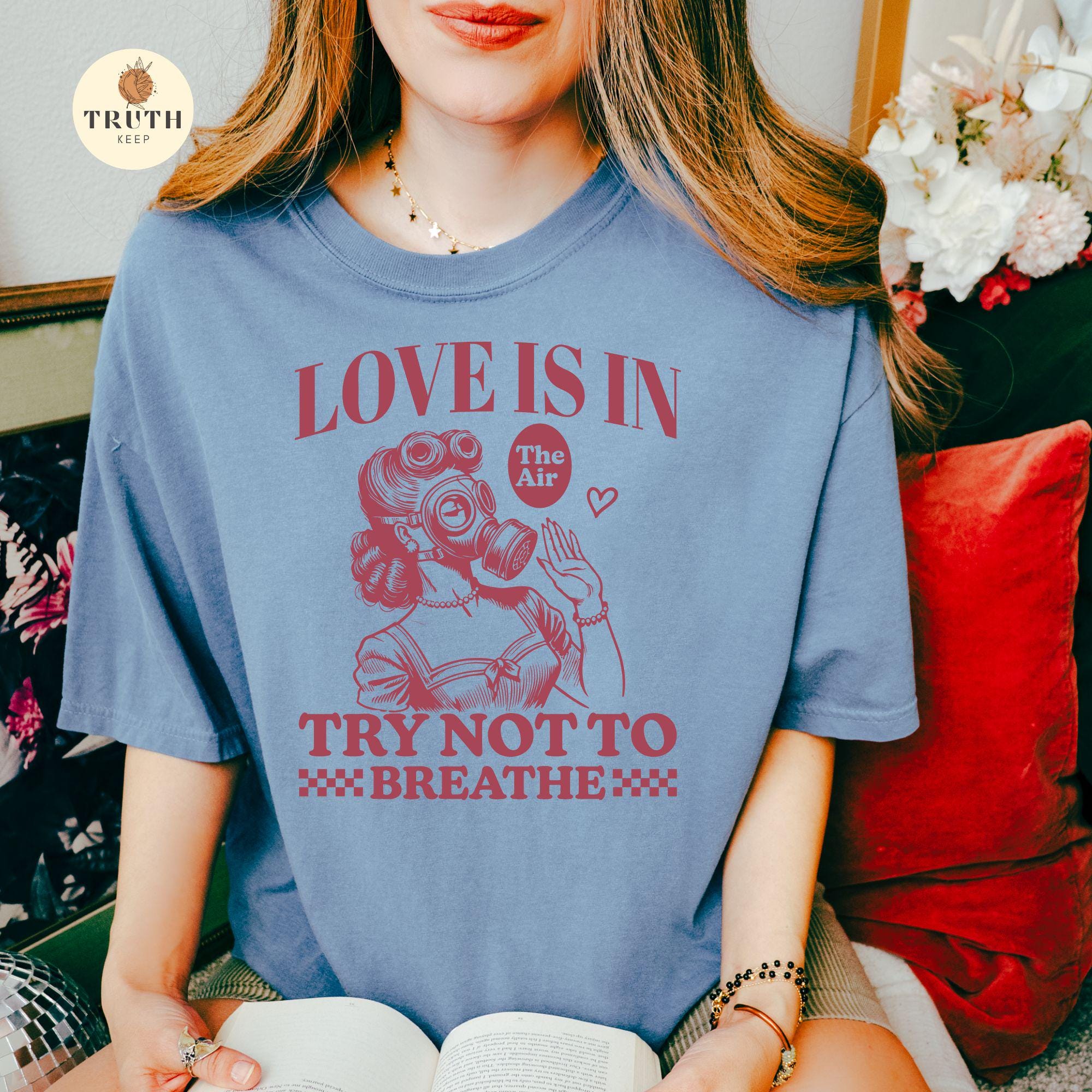 Funny Anti-Valentine Woman Graphic T-Shirt – Love Is in the Air Humor Tee