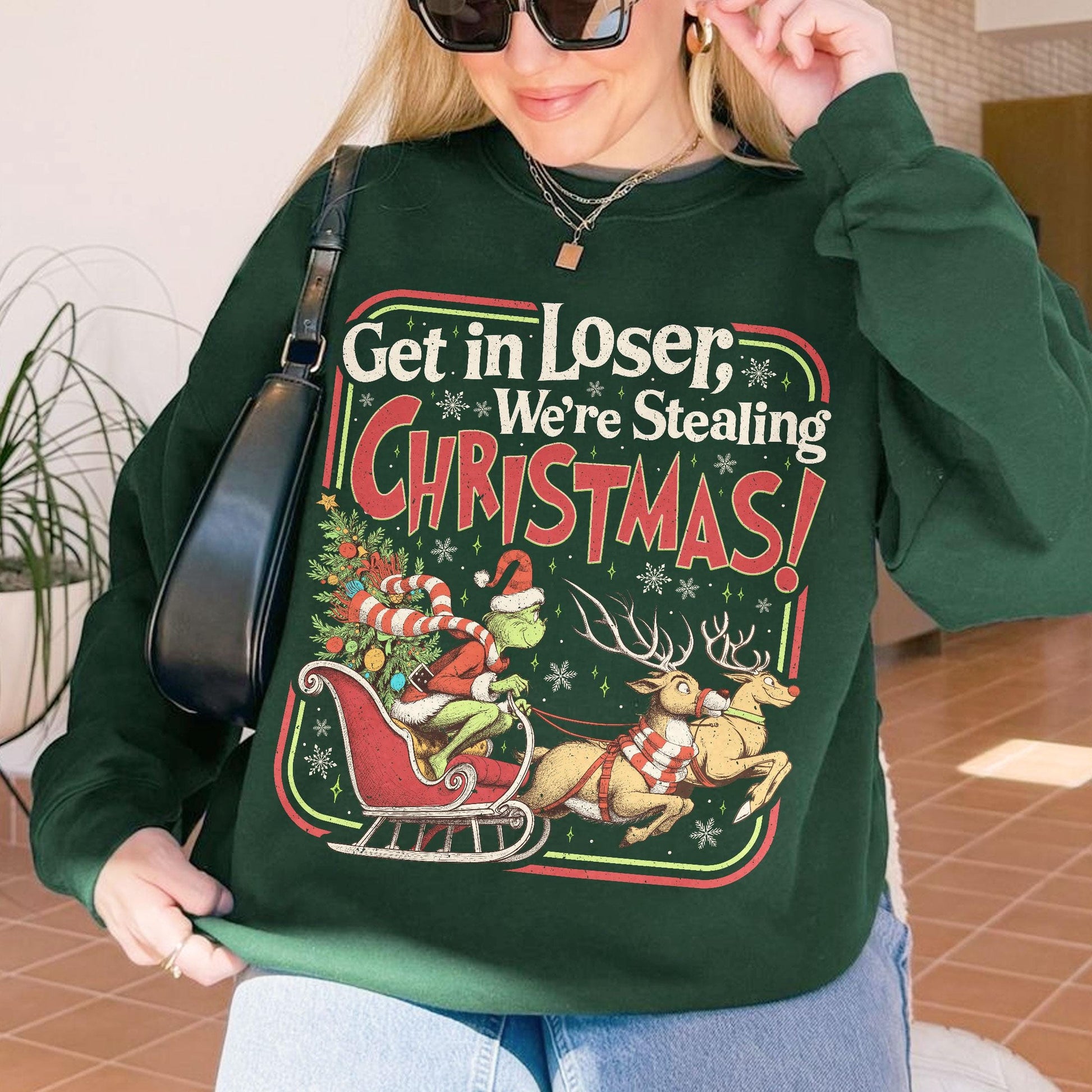 Get In Loser We’re Stealing Christmas Sweatshirt – Funny Holiday Crewneck, Christmas Town Green Animal Shirt