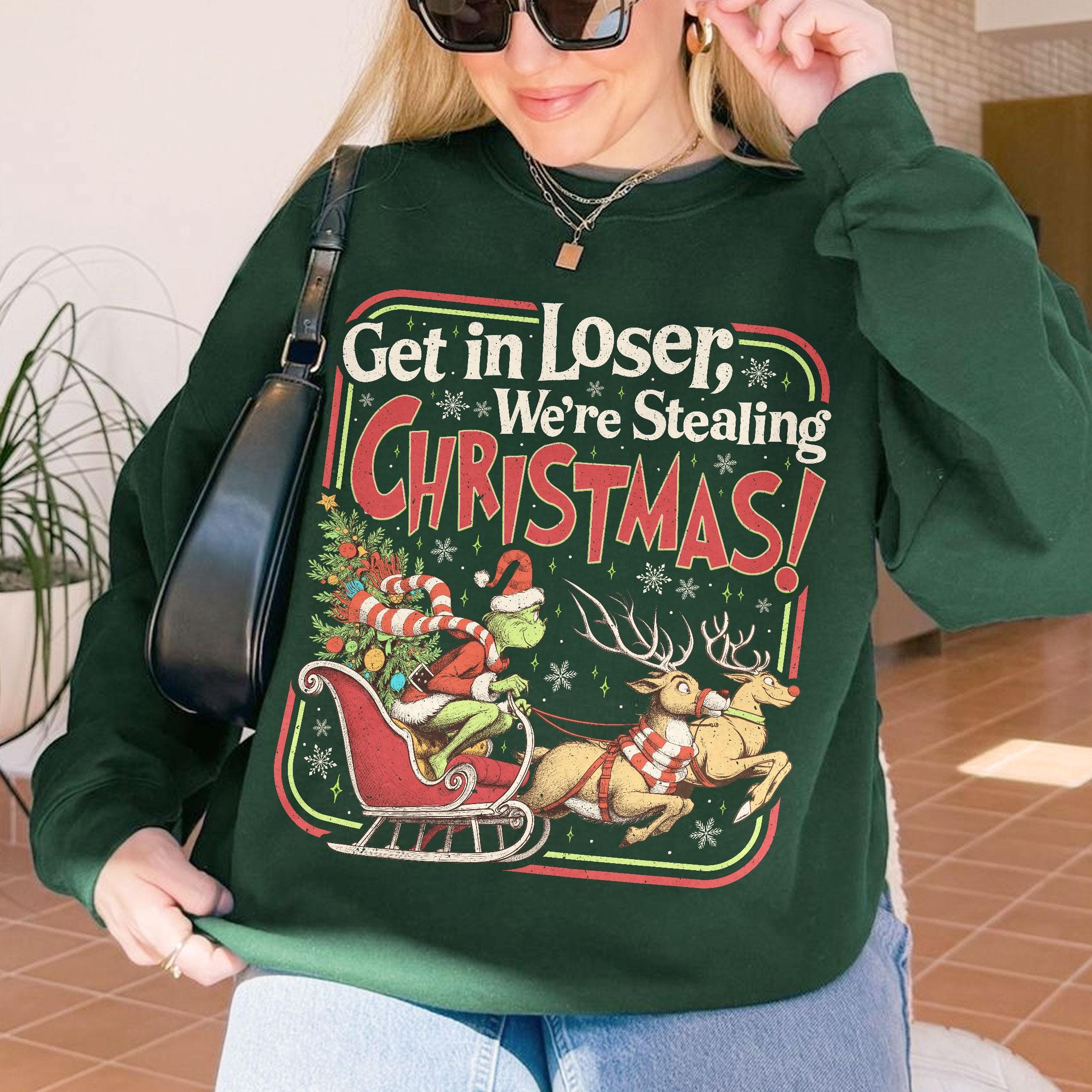 Get In Loser We’re Stealing Christmas Sweatshirt – Funny Holiday Crewneck, Christmas Town Green Animal Shirt