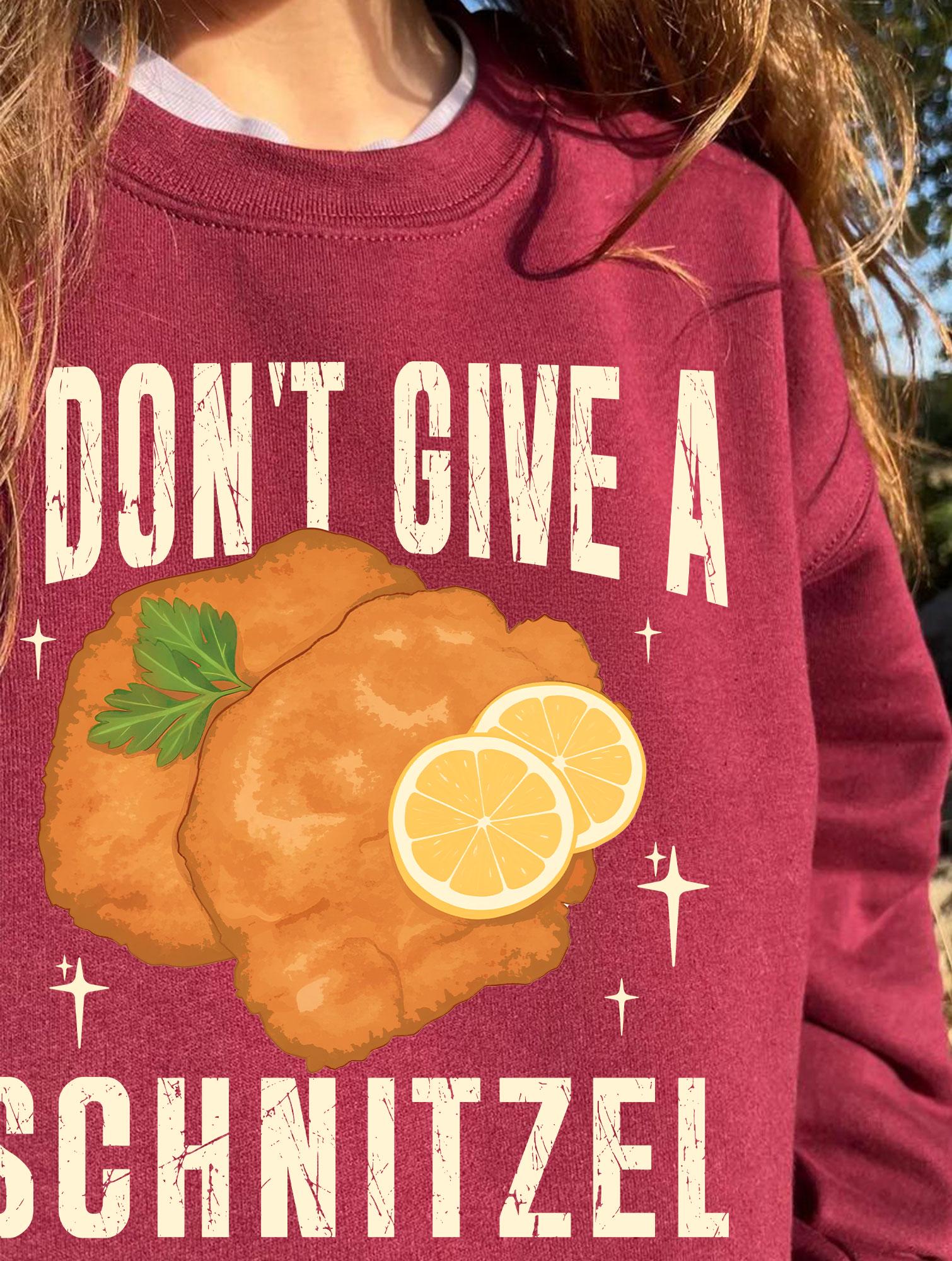 I Don’t Give a Schnitzel Christmas Sweatshirt – Funny A Very Jo Na S Holiday Movie Shirt