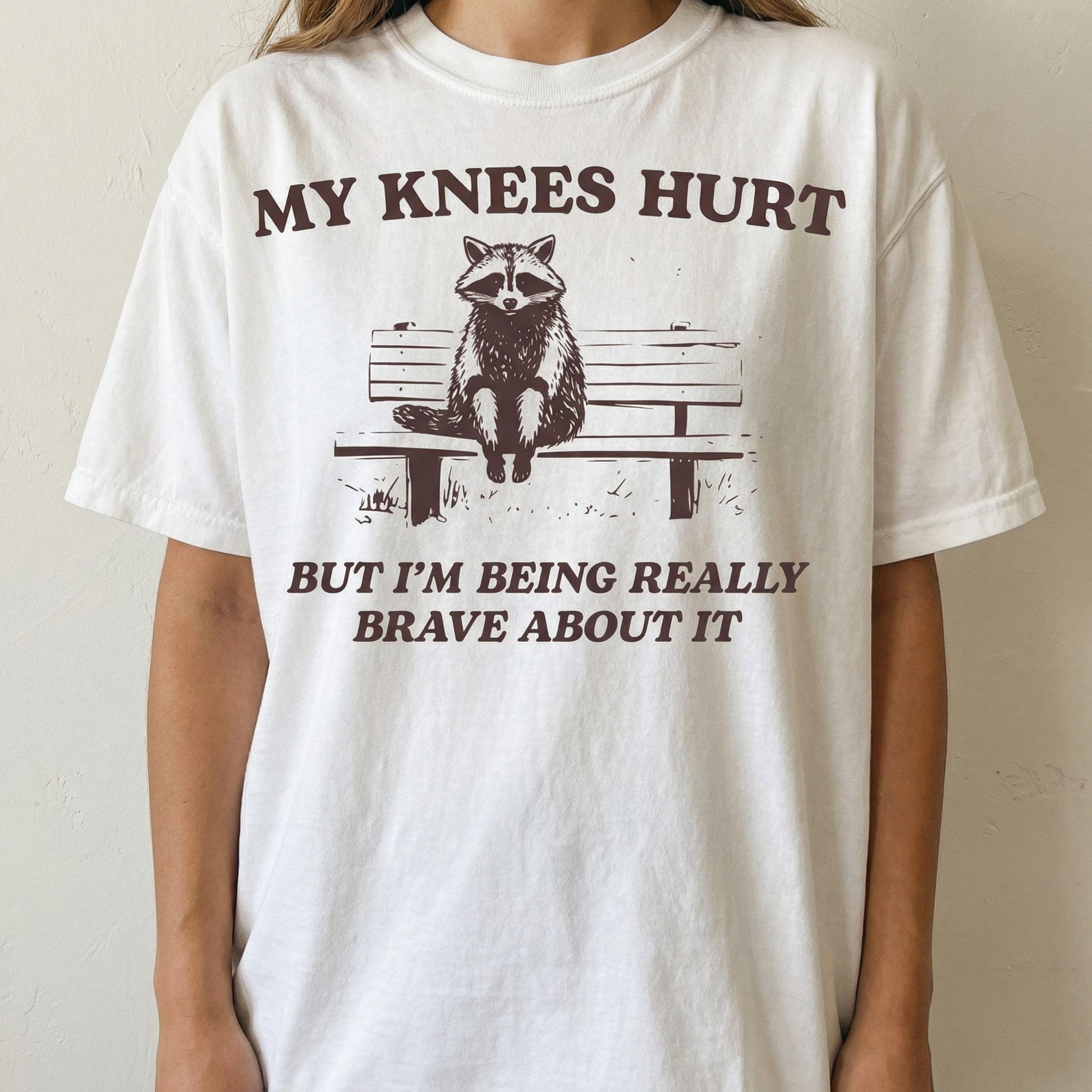 My Knees Hurt Raccoon Graphic T-Shirt – Funny Hiking Meme Tee – Gift for Dad