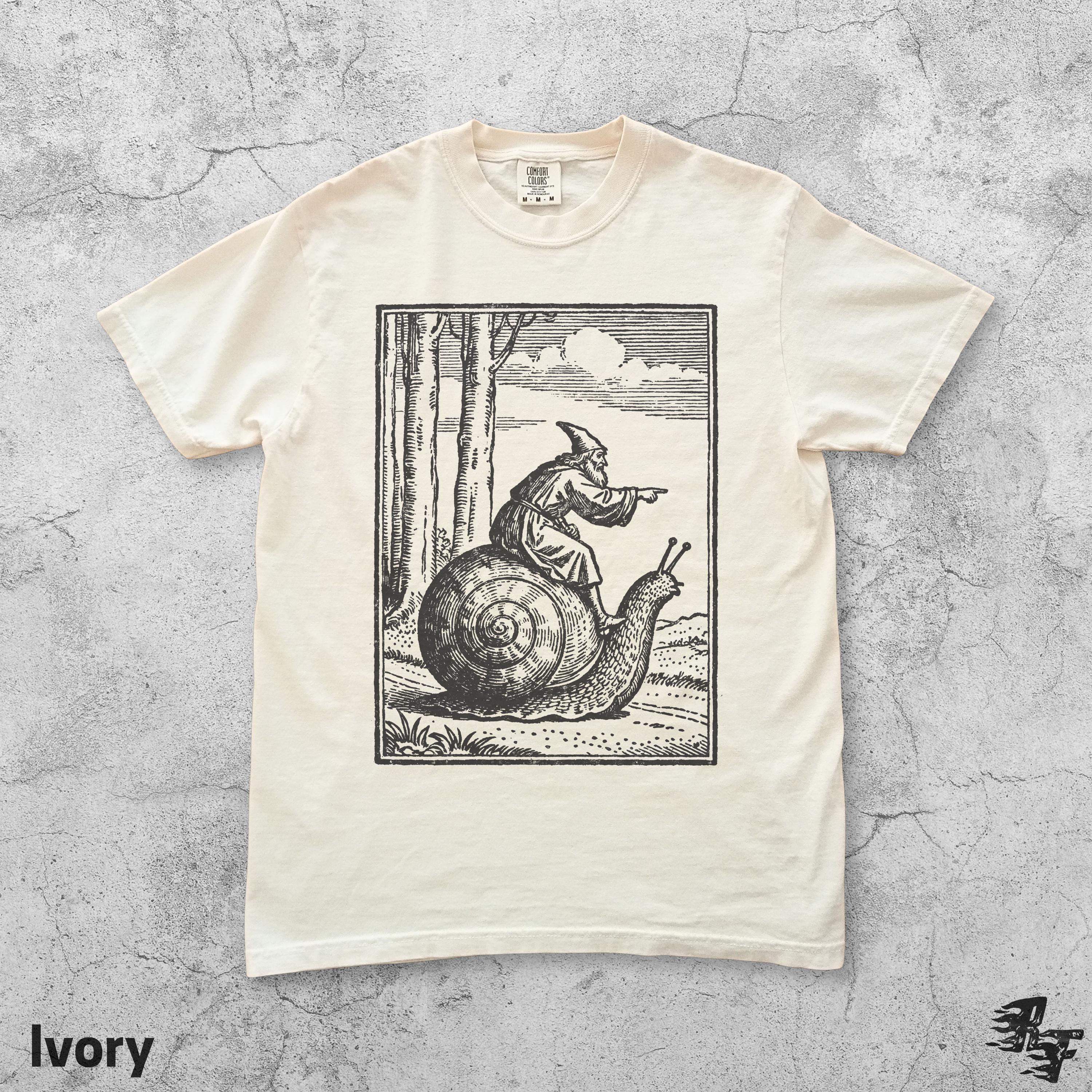 Retro Medieval Snail Rider Graphic T-Shirt - Vintage Fantasy Humor Tee