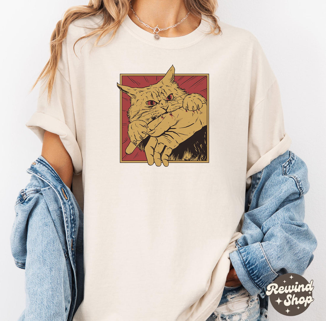 Vintage Cat Bite Shirt – Japanese Horror Anime T-Shirt, Retro Scary Cat Graphic Tee for Unisex