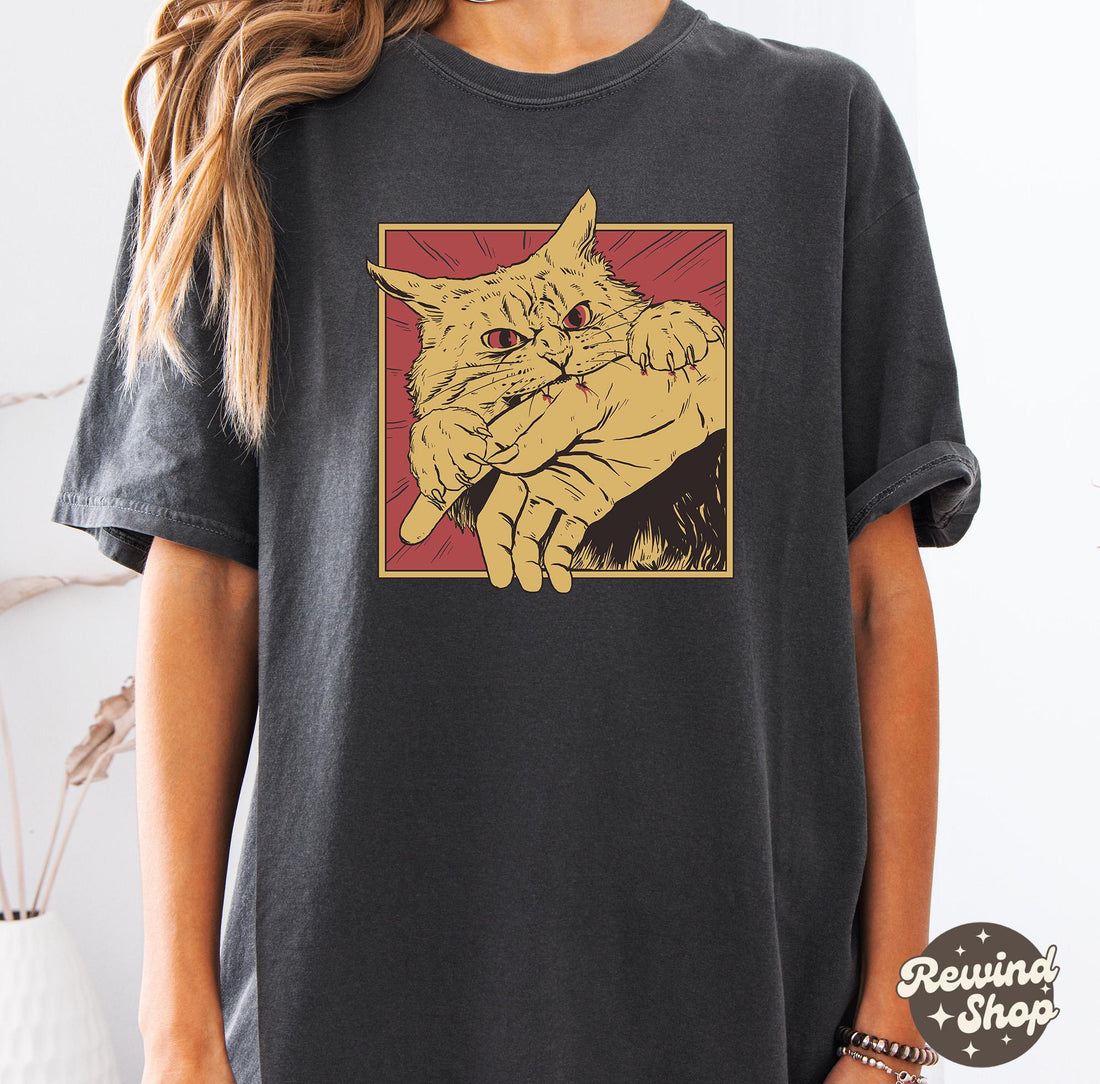 Vintage Cat Bite Shirt – Japanese Horror Anime T-Shirt, Retro Scary Cat Graphic Tee for Unisex