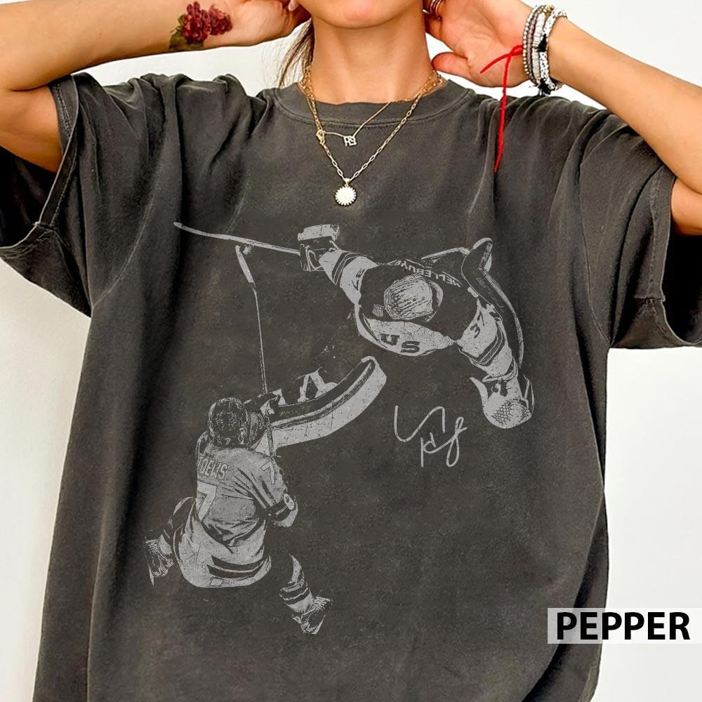 Vintage Hellebuyck Hockey Goalie Graphic T-Shirt – Retro Sports Fan Unisex Tee